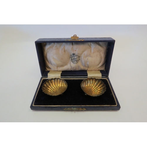 1362 - A pair of silver salts of shell form, in fitted case