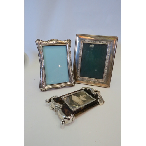 1365 - A silver photo frame and two others   (C)