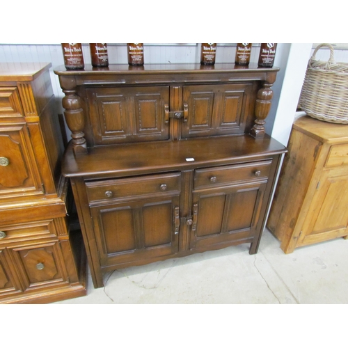 2171 - An Ercol oak court cupboard