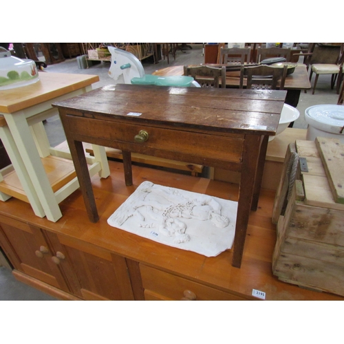 2194 - A George III country oak side table with bow front top, single drawer, on square legs