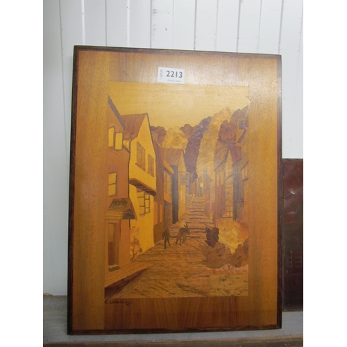 2213 - A marquetry inlaid wall panel of multipul woods