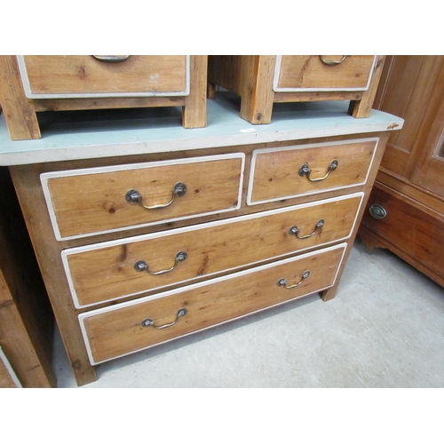 2221 - A rustic pine chest of two short over two long drawers, grey painted top, brass swan neck handles