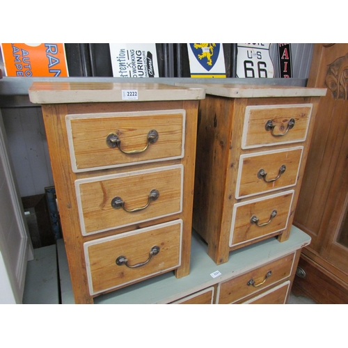 2222 - A pair of rustic pine bedside chests of three drawers, brass swan neck handles