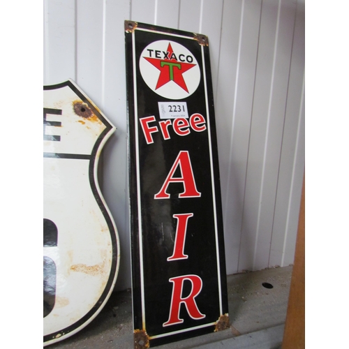 2231 - An enamel sign Texaco 40 x 12cm