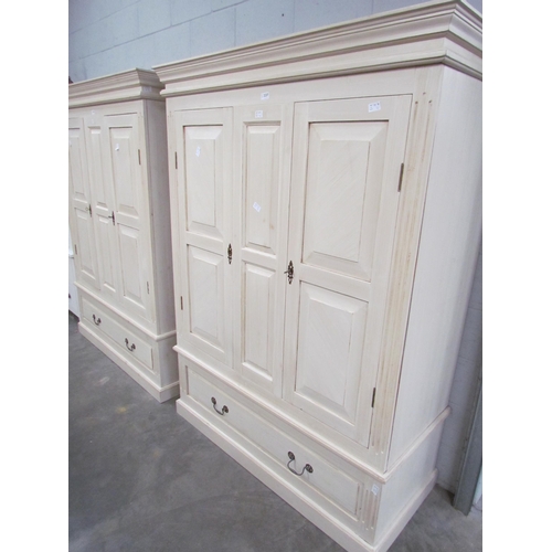 2237 - A white painted wardrobe, two doors over single drawer, plinth base