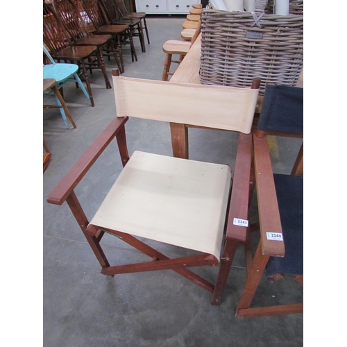 2243 - A folding teak directors chair           (R) £20