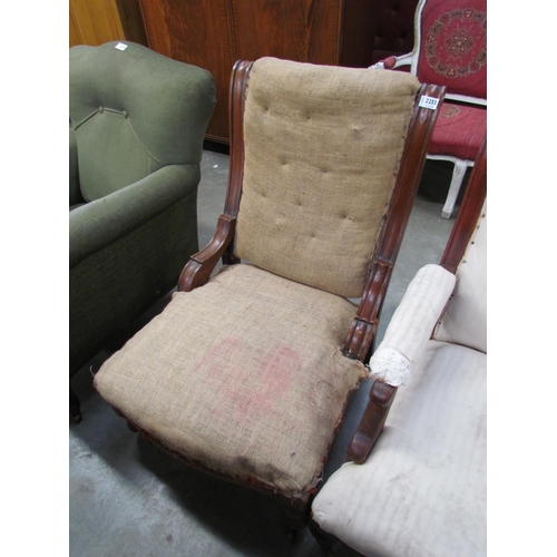 2255 - A Victorian mahogany framed fireside chair for recovering       (E) £30-40