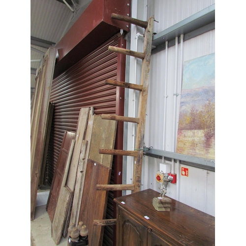 2306 - A 19th Century pine saddle rack