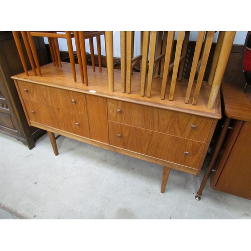 2312 - A teak four drawer sideboard chest 