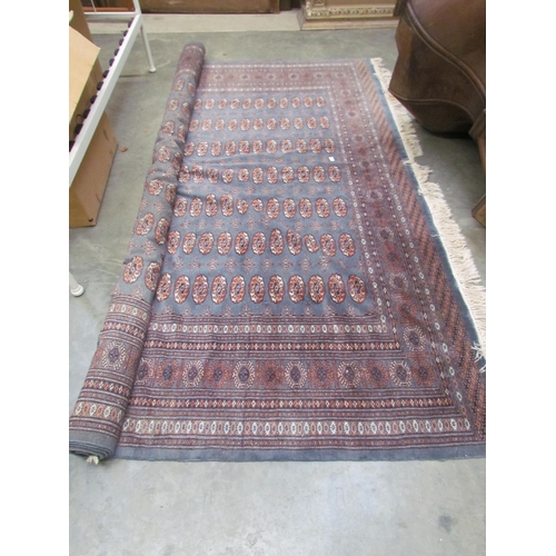 2330 - A large blue ground lounge rug