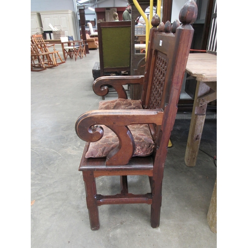 2001 - A Victorian Welsh Gothic pitch pine chair with scrolled arms          (R) £100