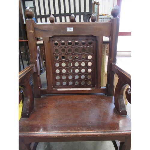 2001 - A Victorian Welsh Gothic pitch pine chair with scrolled arms          (R) £100