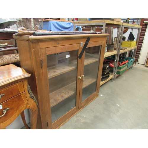 2018 - A pine and glazed bookcase