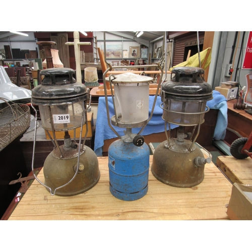 2019 - Two enamel top Tilley lamps and another