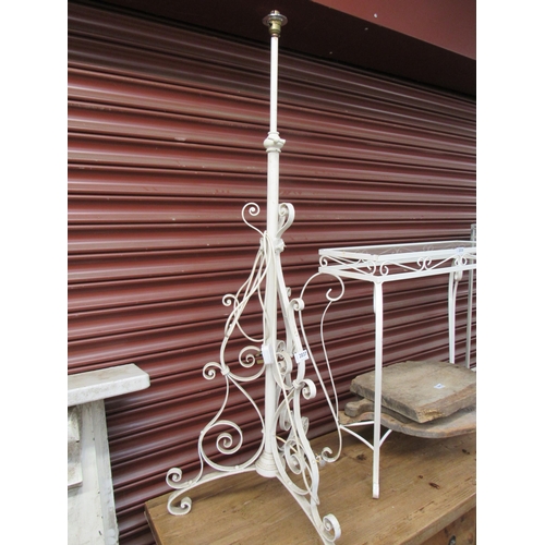 2037 - A Victorian wrought iron height adjustable standard lamp