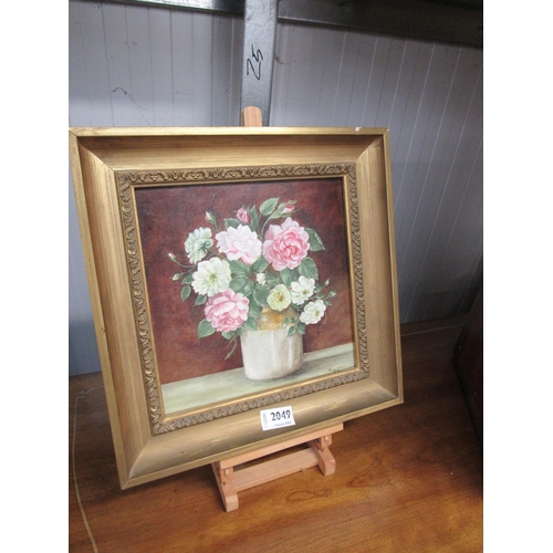 2049 - A Jane Harvey oil on board of flowers