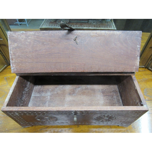 2060 - A heavily carved hardwood and metal bound table top box