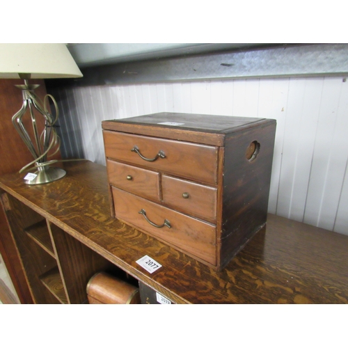 2075 - A 1930's Elm oriental desk top chest of 4 drawers