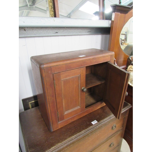 2080 - A 1930's mahogany two door wall hanging cupboard, hinge a/f