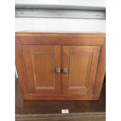 2080 - A 1930's mahogany two door wall hanging cupboard, hinge a/f