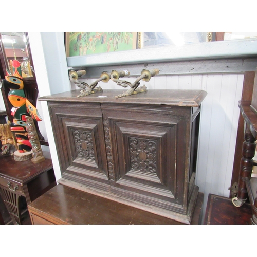 2096 - An Edwardian oak cabinet with two interior drawers           (R) £30