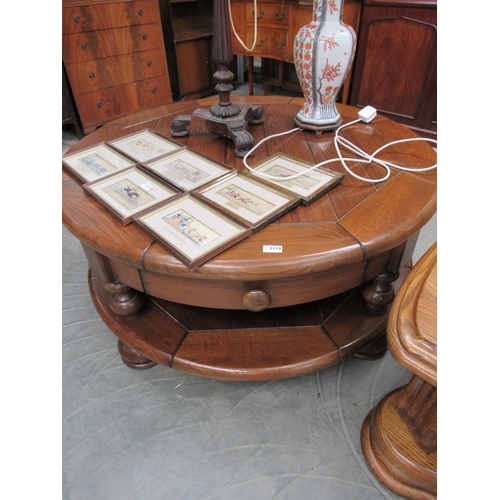 2118 - A substabtial oak, two tier French circular coffee table     (E) £15-30