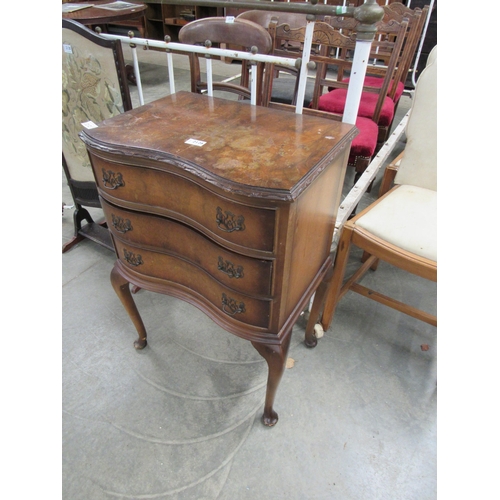 2126 - A walnut bedside chest of three drawers           (R) £30