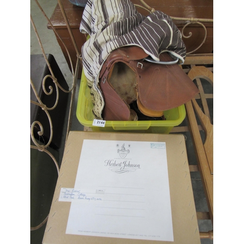 2144 - A box of horse leather tack, ash boot jack and a panamar hat unused with receipt