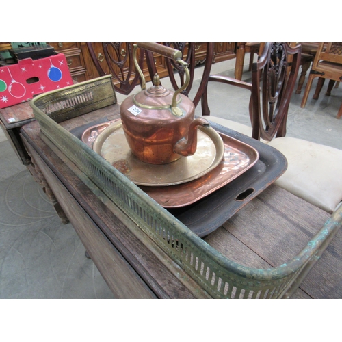 2154 - Three copper butlers trays and a copper kettle plus a copper fire fender