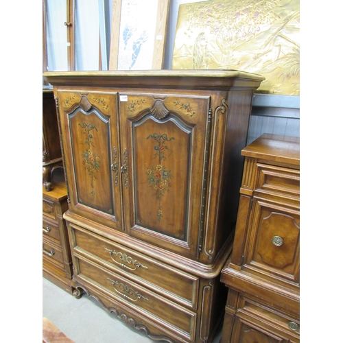 2169 - A French hand painted drinks cupboard with fitted interior over two drawer base