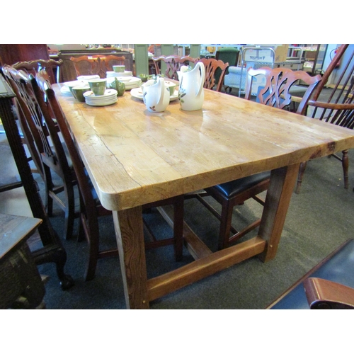 1139 - A rustic pine plank-top refectory dining table, 180.5cm x 94.5cm