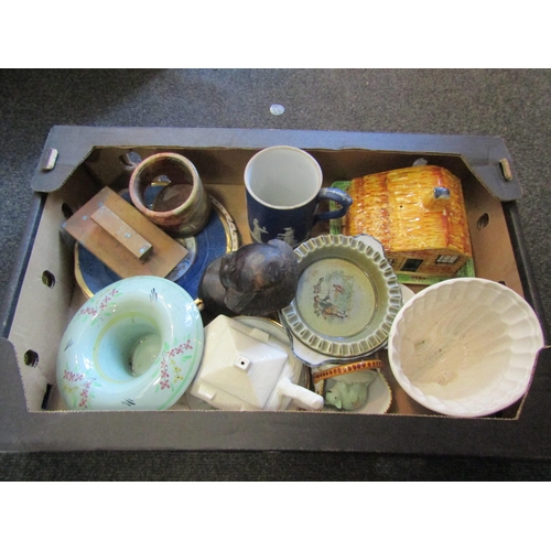 1204 - A box of assorted items including a jelly mould, Wedgwood Jasperware tankard, carved wooden bust etc... 