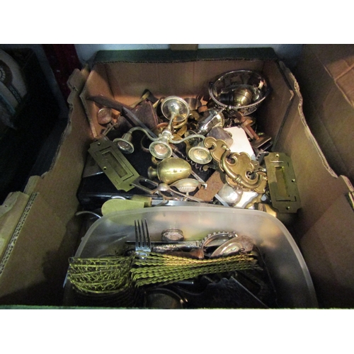 1214 - A box of metalwares to include handles and yellow metal filigree spoons