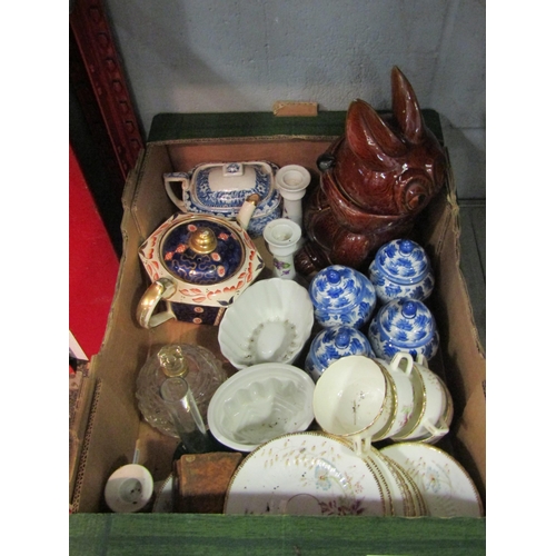 1224 - A box of ceramics to include blue and white storage jars, jelly moulds, tea wares etc.