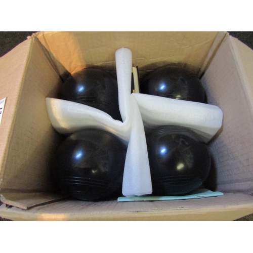 1247 - A set of four Henselite 'Classic' lawn bowls. Size 6 medium