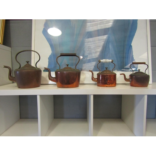 1253 - Four bygone copper kettles