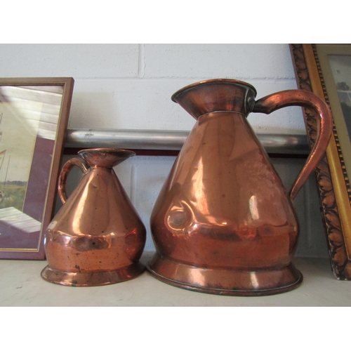 1377 - Two Victorian copper measure jugs