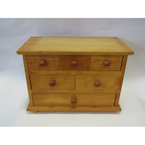 1430 - A modern pine low chest of six drawers, turned knobs, 31cm tall x 44cm wide x 23cm deep