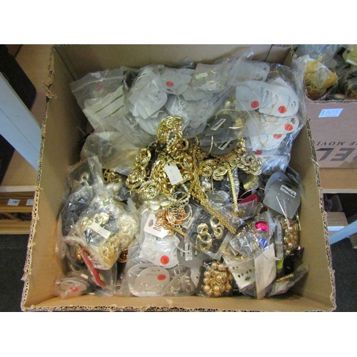 1453 - Three boxes of costume jewellery, many in original packaging