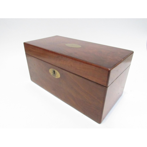 4048 - A mahogany tea caddy with two hinged lidded tea cannisters and glass mixing bowl