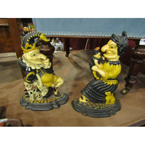 4011 - Two Punch and Judy cast iron painted door stops, 30cm tall