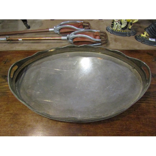 4014 - A silverplate oval galleried tray, 60.5cm long