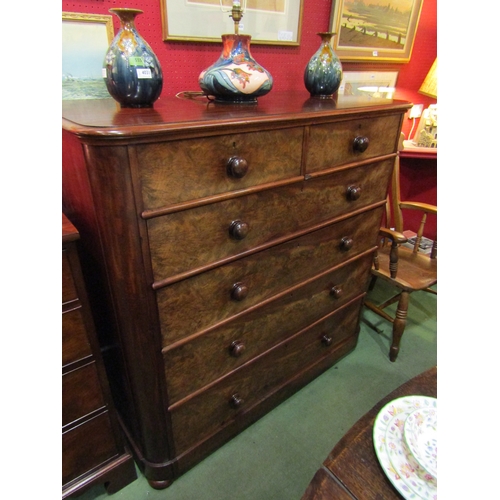 4034 - A Circa 1860 flame mahogany round cornered chest of two short over four graduating long drawers with... 