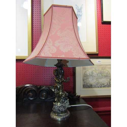 4050 - A gilt figural table lamp with shade