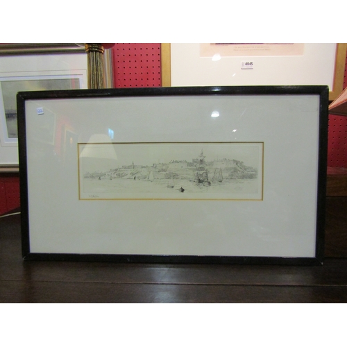 4053 - W L WYLLIE:  A pencil signed etching of sailboats at Malta.  Framed and glazed.  8.5cm x 33cm image ... 