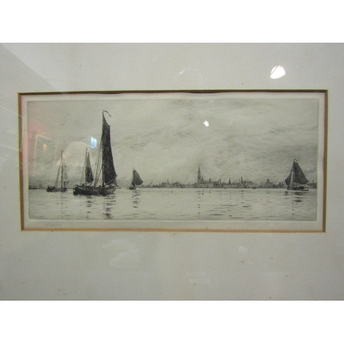 4054 - W L WYLLIE: A pencil signed etching of sailing boats near the coast, a/f light foxing to mount.  Fra... 