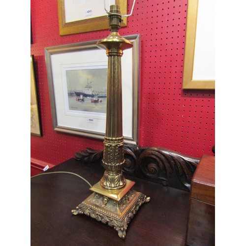 4047 - A cast metal table lamp of column form