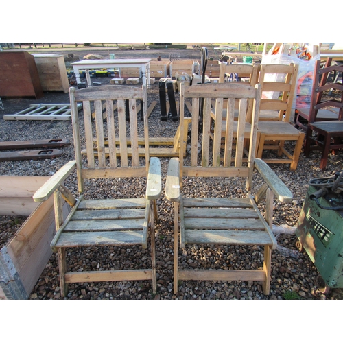 3211 - A pair of hardwood chairs