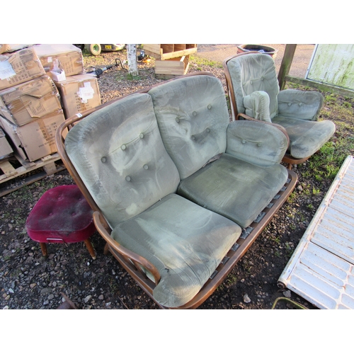 3295 - A two seater Ercol sofa and matching armchair