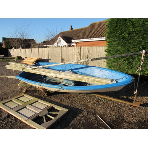 3349 - A fibreglass dinghy with launch, a/f. Plus a bundle of timber